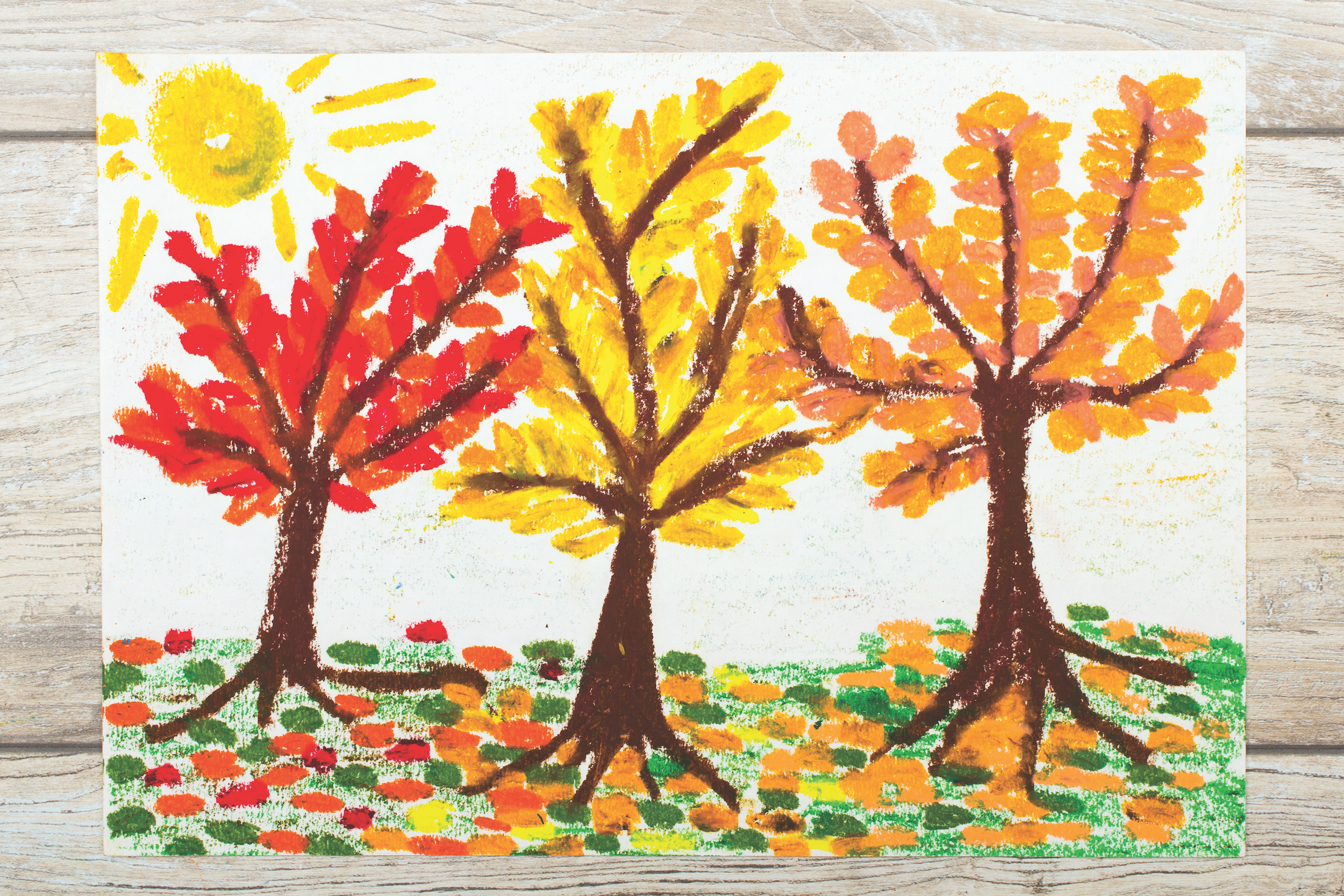 Photo of colorful drawing: Autumn landscape, trees with yellow, orange and red leaves