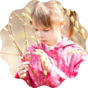 young girl investigates nature