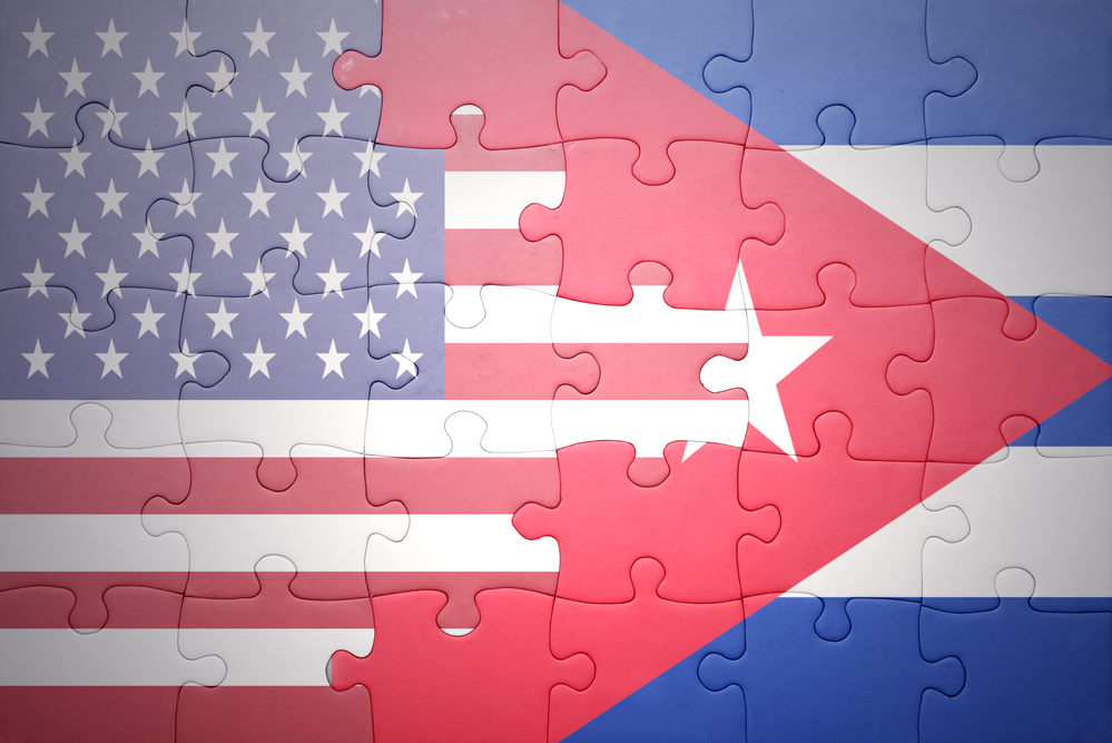 puzzle with the national flag of united states of america and cubaa