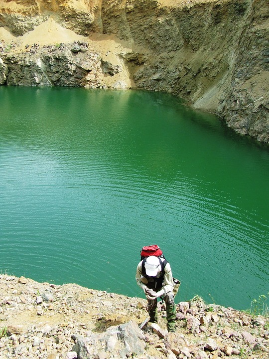 geologist picking up rocks