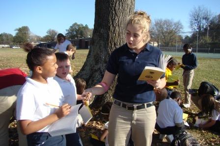Young teacher takes classroom outdoors
