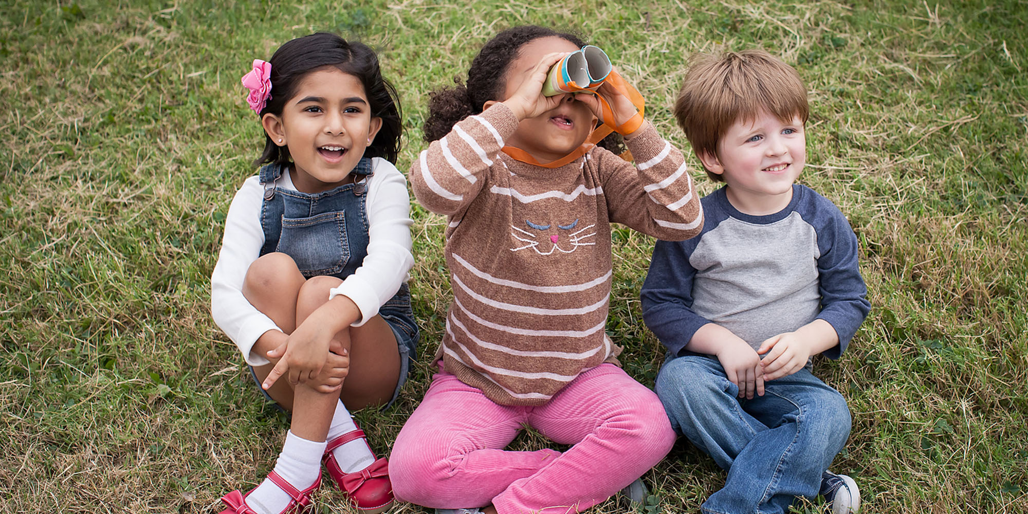 children with paper binoculars